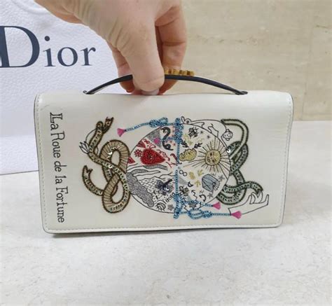 dior tarot card clutches